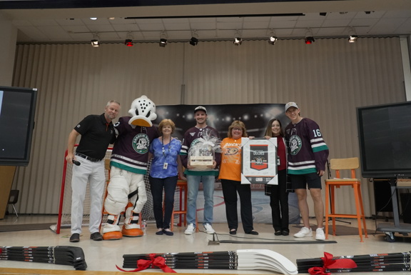 Betsy Ross staff accepting a gift