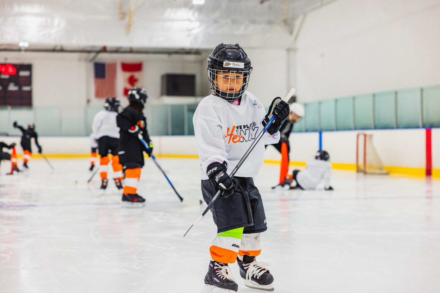 Young girl in hockey gear