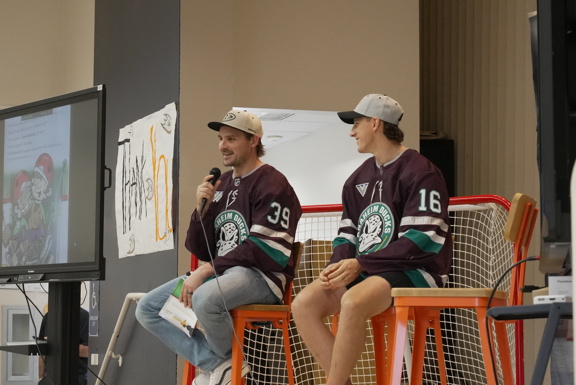 Sam Carrick talking on the mic