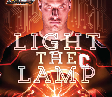Light the Lamp First Flight cover- hockey player holding electric ball